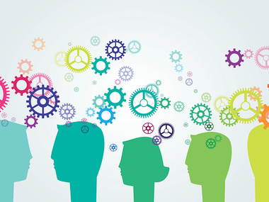 heads with cogs and gears above them